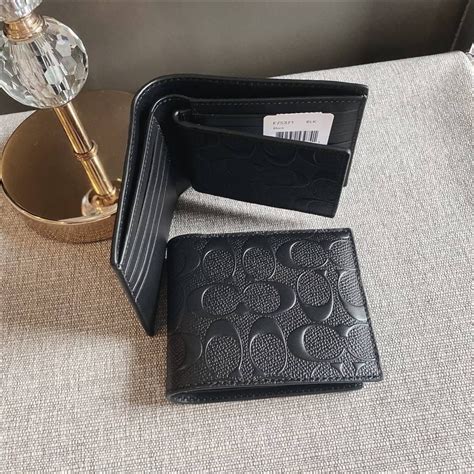 men coach wallet sale price.